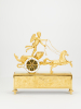 A charming French Empire ormolu chariot clock, circa 1810