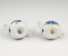 A pair of rare Chinese porcelain miniature jugs.