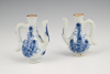 A pair of rare Chinese porcelain miniature jugs.