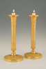 A pair of  ormolu bronze Empire candle sticks