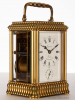A French gilt gadrooned gorge case carriage clock by Lepine, circa 1880