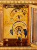 A small French glit brass travel clock by Lepine, circa 1900.