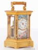 A sub miniature Swiss gilt brass and enamel carriage clock, circa 1890.