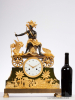A French Empire bronze and ormolu mantel clock personifying America, circa 1800.