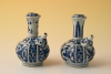 A pair of Chinese porcelain Kendi's