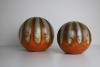 LJ Muller, plateelbakkerij Zuid-Holland, two pumpkin-shaped ball vases with Muvelee decor. - Leendert Johan Muller