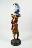Polychrome painted wooden tobacco man with a Delft tobacco jar