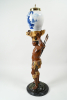 Polychrome painted wooden tobacco man with a Delft tobacco jar
