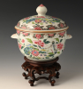 A Chinese porcelain Famille Rose lidded jar