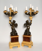 A pair of large Empire candelabras