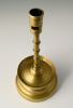 A Dutch bronze candlestick