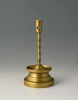 A Dutch bronze candlestick