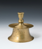 Een bronzen kandelaar