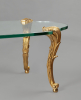 A gilt bronze and glass coffee table – Signed P.E. Guerin New York