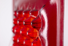 Louis la Rooy (Amsterdam 1947), red glassobject in metalen stand - Louis La Rooy
