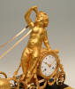 A very rare Empire mantle clock