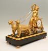 A very rare Empire mantle clock