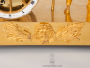 A French Empire gilt bronze mantel clock water seller, circa 1810