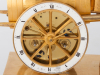 A French Empire gilt bronze mantel clock water seller, circa 1810