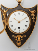 A rare and small French Empire bronze cartel wall clock, circa 1810.