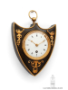 A rare and small French Empire bronze cartel wall clock, circa 1810.