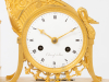 A French Empire ormolu mantel clock 'Ars Amatoria', circa 1800