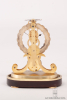 A miniature English brass skeleton clock, Fenton Bury, circa 1850.