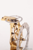 A miniature English brass skeleton clock, Fenton Bury, circa 1850.