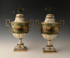 A pair of rare pewter chestnut vases