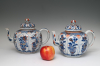 A pair of large Chinese Imari teapots