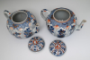 A pair of large Chinese Imari teapots