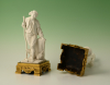 A set of two decorative biscuit-porcelain figures