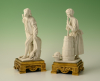 A set of two decorative biscuit-porcelain figures