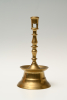 A Dutch bronze candlestick