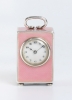 A miniature Swiss silver pink translucent guilloche enamel timepiece, circa 1900.