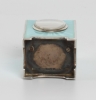 A miniature Swiss silver light blue guilloche translucent enamel timepiece, circa 1900