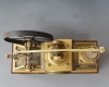 Een Guilmet industrie klok, vliegwiel pompklok met barometer en thermometer, ca. 1890.