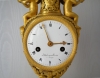 An exceptional cast and modelled Directoire urn-clock, ode to love and music, by Delecoeuillerie à Tournay, ca. 1795.