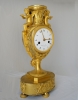 An exceptional cast and modelled Directoire urn-clock, ode to love and music, by Delecoeuillerie à Tournay, ca. 1795.