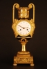 PV04 Vaseshape mantelclock with gilt and patina case