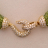 Interchangeable precious stone/pearl necklace.