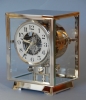 M203 Nickel plated art deco J. L. Reutter four-glass Atmos clock.