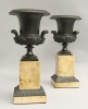 Bronze Medici vases on marble bases
