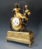 Superb gilt and patinated bronze sculptural mantel clock, 