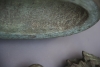 An unusual bronze wall decoration possibly Masonic or Mathematic symbols