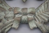 An unusual bronze wall decoration possibly Masonic or Mathematic symbols