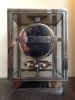 M211 Nickel plated art deco J. L. Reutter four-glass Atmos clock
