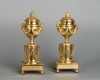 A pair of French Louis XVI ‘a double usage’ candlesticks, with rose mercury gilding