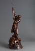 A bronze model of St Michael overcoming the devil after John Flaxman, 1903