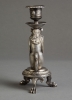 An unusual Silvered candle stick of an old man as fantasy figure, circa 1880
